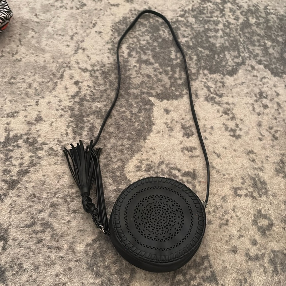 black purse with tassel